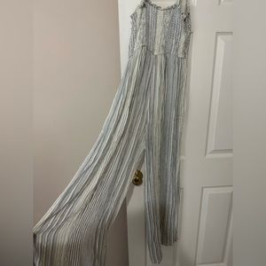 White and blue stripped jump suit